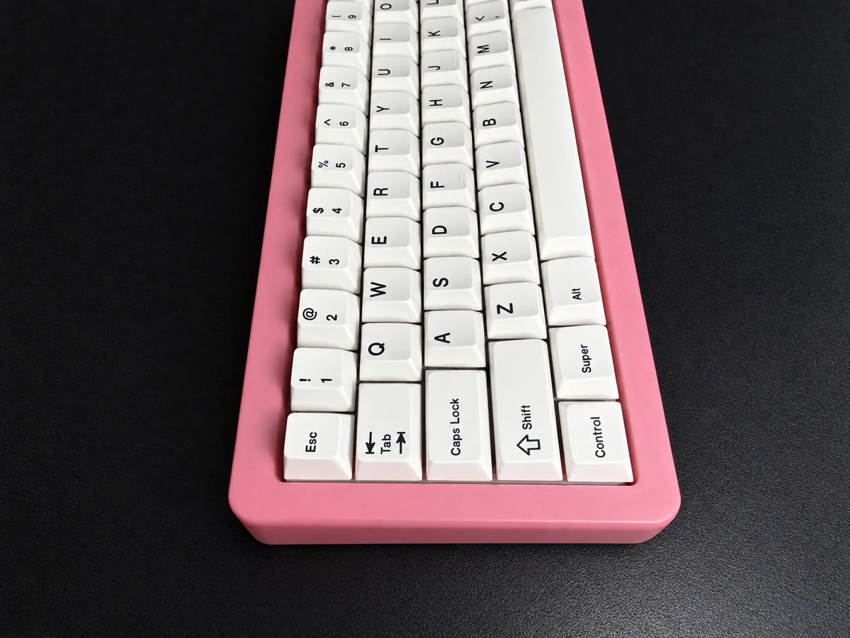 Odin Gaming Aurora65 LITE Galaxy Pink keyboard, close-up of the pink case and installed white keycaps.