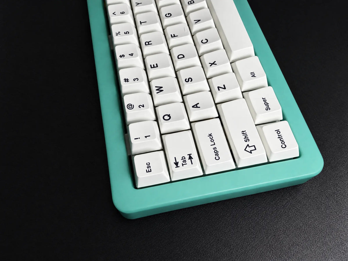 Odin Gaming Aurora65 LITE Neptune Green keyboard, angled close-up of the translucent green case and installed white keycaps.